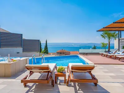 Private heated pool and 6 comfortable lounge chairs